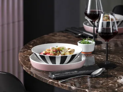 Iconic table setting with a precise layout, clear graphics and deliberate colour effects for stylish individual Iconic Dining.