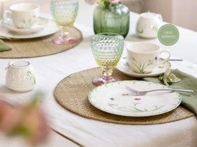 Colourful spring tablesetting paired with Boston glassware with free shipping callout Colourful spring table setting paired with Boston glassware, featuring a bright seasonal arrangement and a free shipping promotion.