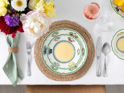 French Garden collection paired with Mademoiselle flatware Aerial view of French Garden plate paired with Mademoiselle flatware.