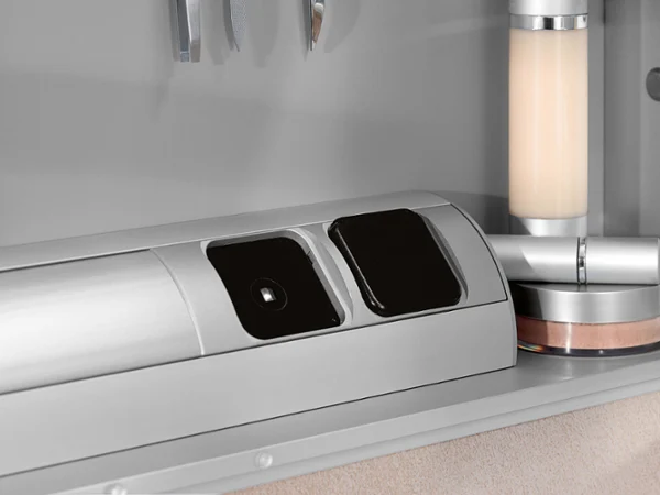 Sockets of the My View mirror cabinet Close-up of a modern mirror cabinet with two sockets. Other bathroom accessories are also visible.