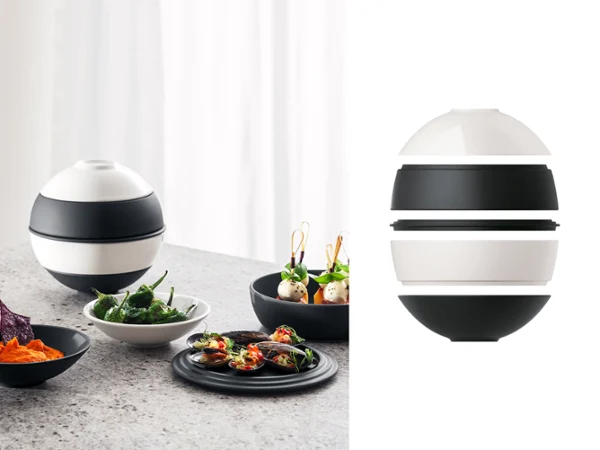 Villeroy & Boch La petite Boule Black and White – modern snacking set and design object Black and white spherical snacking set “La petite Boule” by Villeroy & Boch, arranged with modern bowls and plates on a table with fresh food. To the right, a cropped view of the set against a white background.
