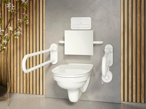ViCare accessible bathroom with a wall-mounted toilet and grab handles A modern accessible bathroom with a wall-mounted toilet, grab handles on both sides, wooden slats as decoration and a grey wall in the background.
