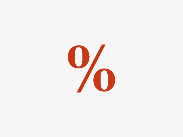 Un symbole de pourcentage rouge est centré sur un simple fond blanc.