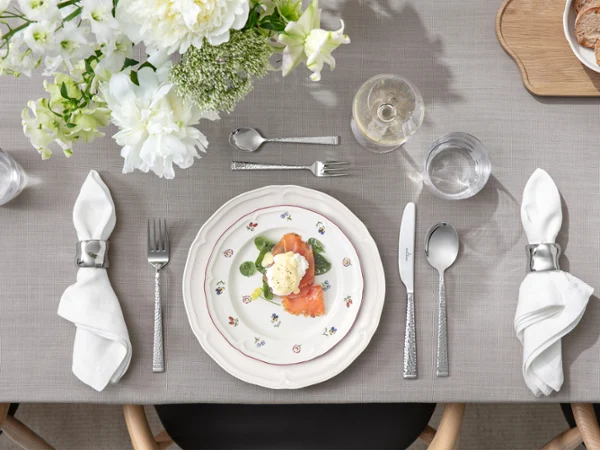 Close-up of Petite Fleur and Manoir plates styled together in a mix-and-match setting.
