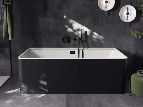 Bathroom washstand in an all-black style All-black bathroom with two Artis surface-mounted washbasins on a black Collaro vanity unit, an illuminated More to See Lite mirror and a Collaro tall cabinet from Villeroy & Boch.