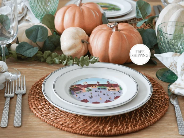 Design Naif Plate paired Boston Green Glass Close-up of a Design Naif plate paired with a Boston Green glass in a fall-inspired table setting with a free shipping callout.
