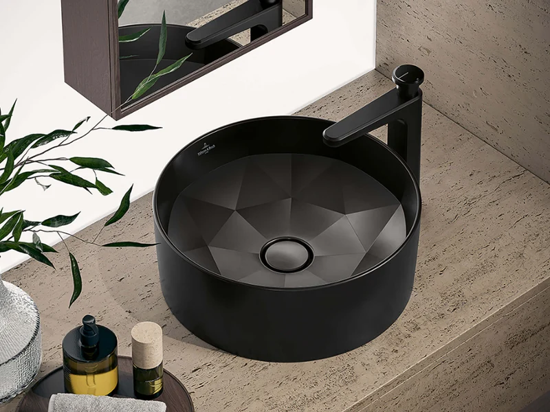 Octagon transforms the washbasin into an architectural statement. Its eight-sided shape creates a striking interplay of angles and surfaces, crafted from exclusive TitanCeram.