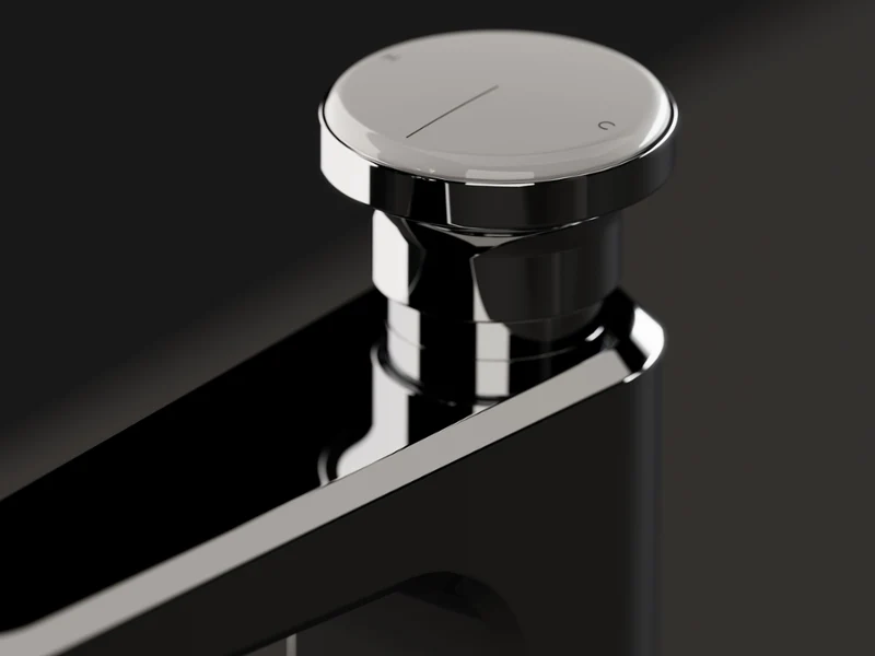 Nærbilde av den svarte blanke Vea-kranen med flakonform. Nærbilde av Villeroy & Boch Vea servantbatteri i krom og alpehvit, hvor det fasetterte flakonlignende designet fremhever eleganse og presisjon.