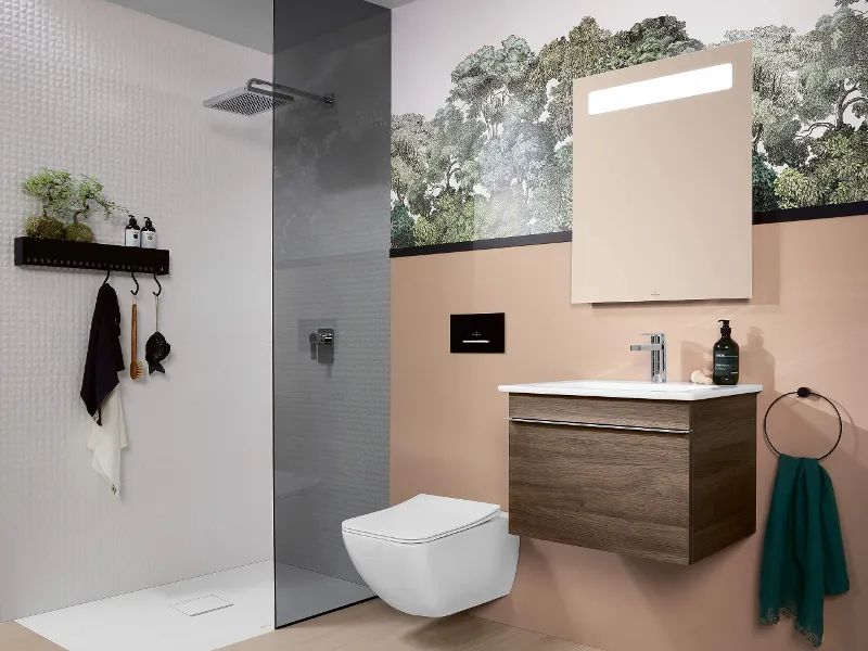 A bathroom with a Venticello toilet, vanity unit and Squaro Infinity shower.