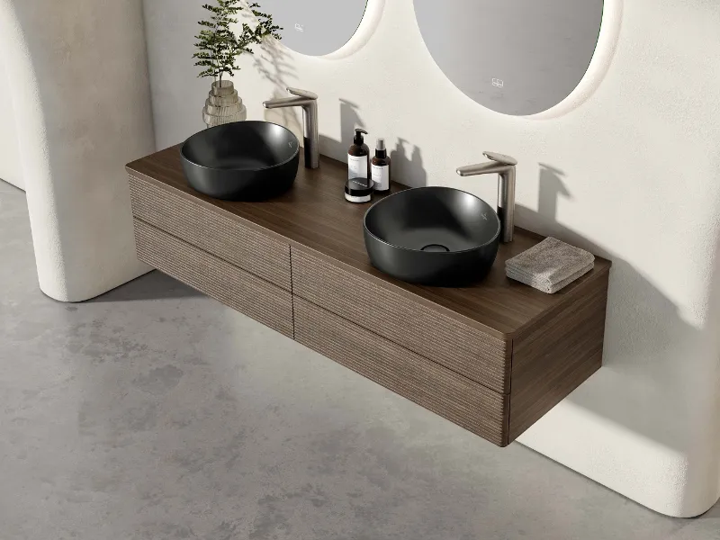 Vanity unit in dark natural shades with two freestanding washbasins, stainless steel taps and mirrors by Villeroy & Boch.