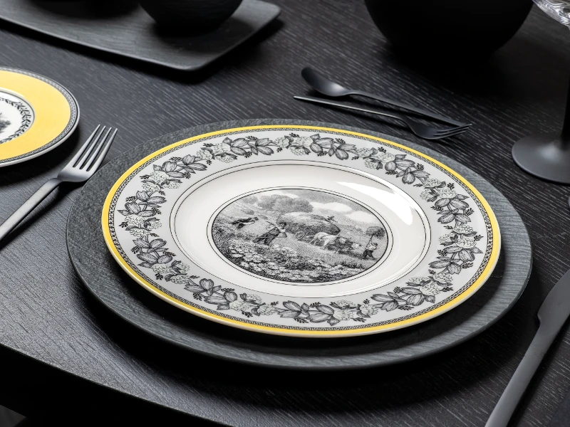 Audun plates in close-up mixed with dinnerware and glassware from Manufacture