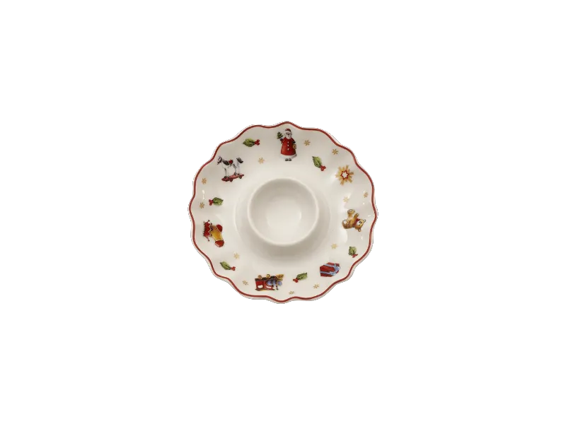 Advent Calendar sneak peak - 15 Egg cup White ceramic egg cup from Villeroy & Boch with a wavy rim decorated with small Christmas motifs like Santa Claus and holly.