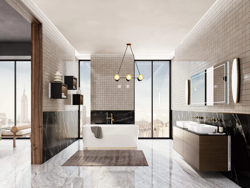Finion bath in a bright bathroom A freestanding bath from the Finion collection in a modern brightly lit bathroom.