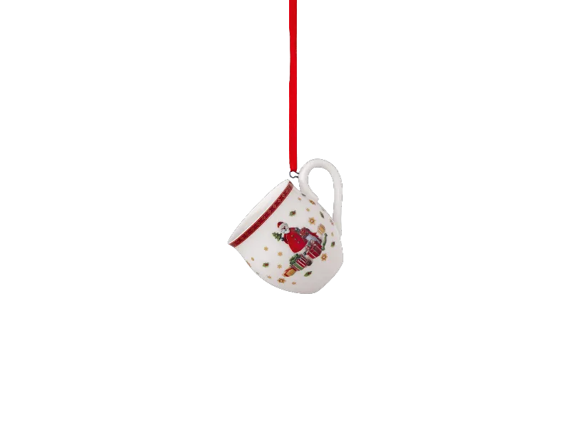 Advent Calendar sneak peak - 02 Mug ornament Villeroy & Boch white ornament mug with a red decor showcases a Santa design, with a red ribbon.
