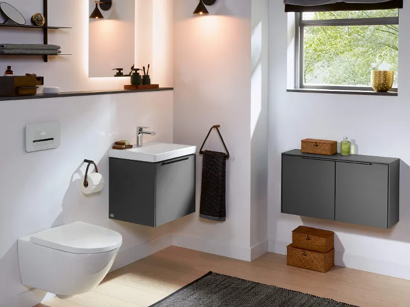 A bathroom with grey Subway 3.0 furniture, washbasin, toilet and mirror.