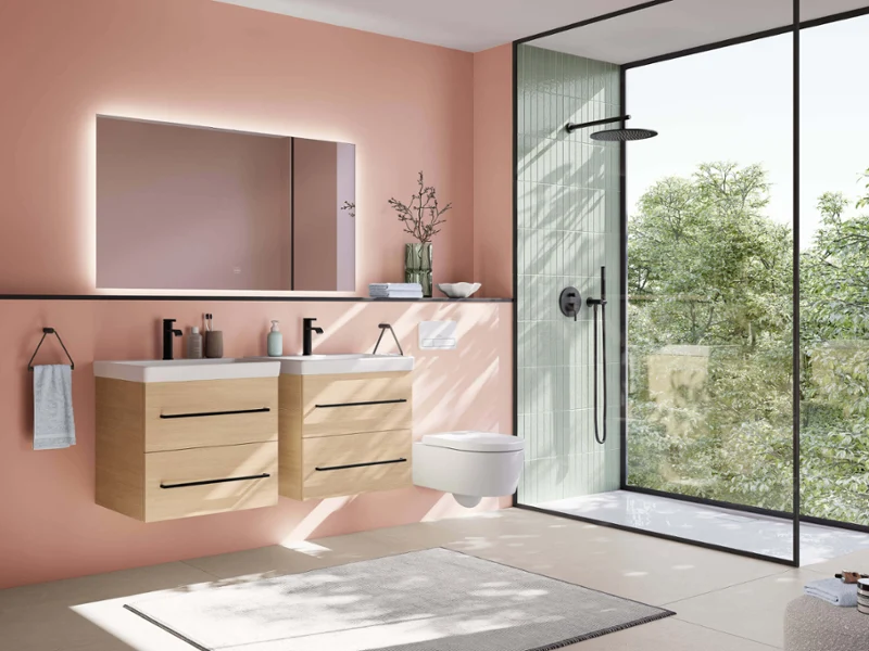 Pastel bathroom with wood vanity and shower area Bright Avento bathroom in soft pastel tones with wooden vanity units, large mirror, walk-in shower, and black accents for a modern country feel.