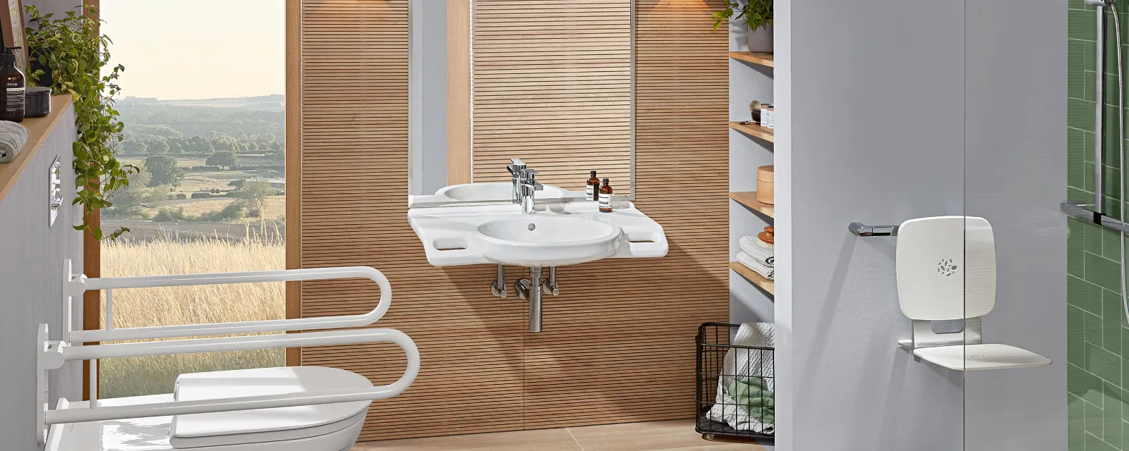 A modern accessible bathroom with a toilet and washbasin from the ViCare collection by Villeroy & Boch.