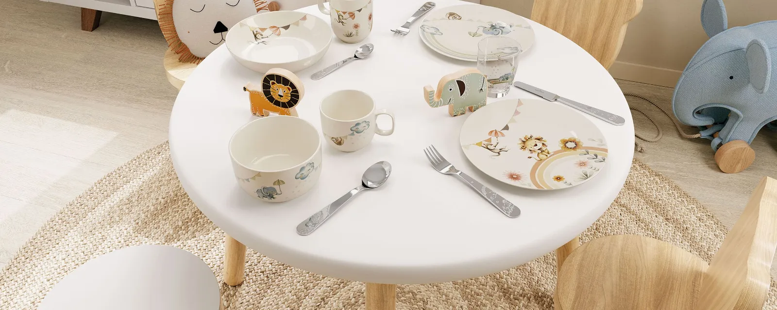 A table setting in a children's room with Boho Kids crockery, cutlery and glasses in an animal theme in pastel colours.