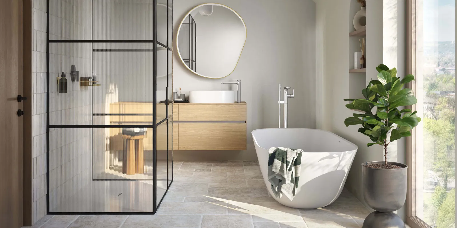 A white Theano Curved Edition bath in a light-coloured bathroom with a floor-to-ceiling window.