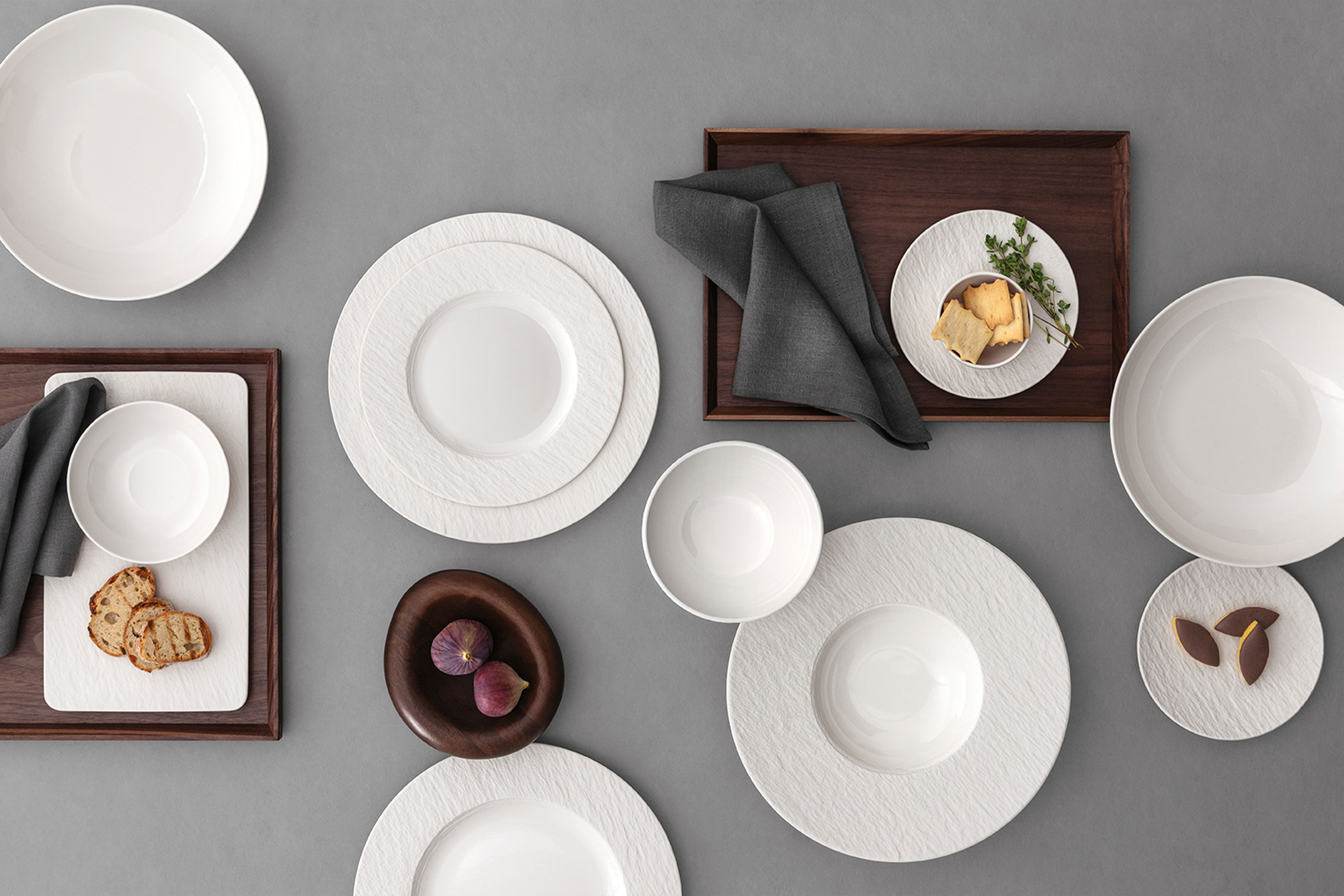Manufacture ice collection picture Manufacture ice collection picture with some plate and bowls with bread on it stand on a grey background